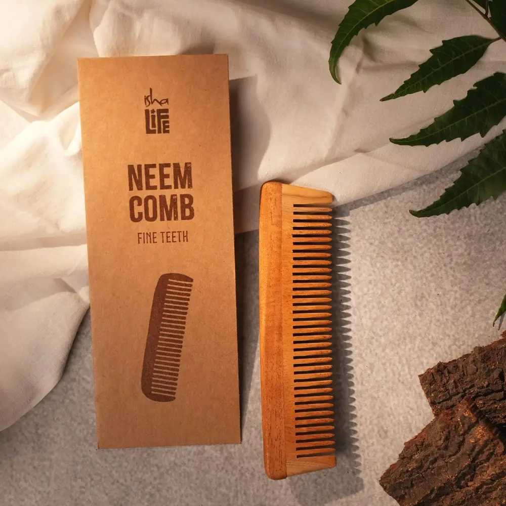 Comb beside its kraft paper sleeve