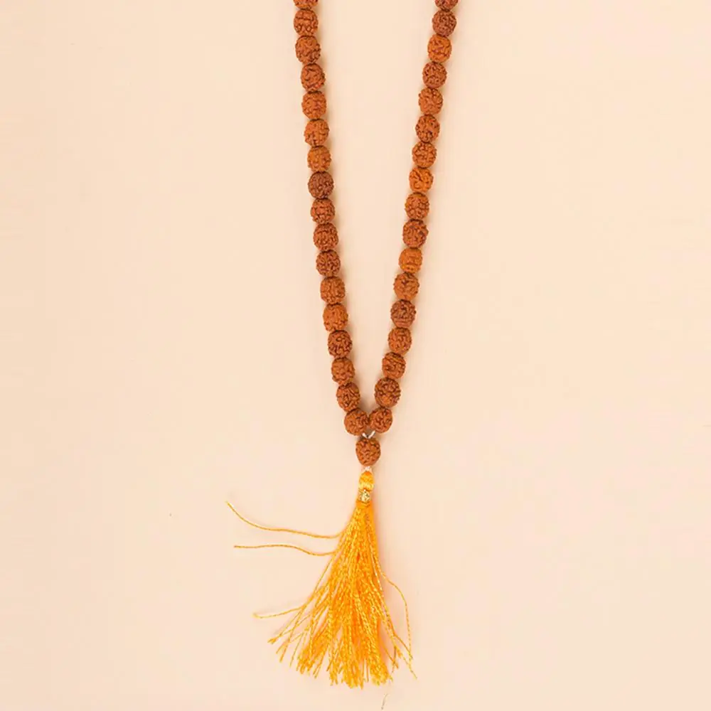 The tassel end of the mala