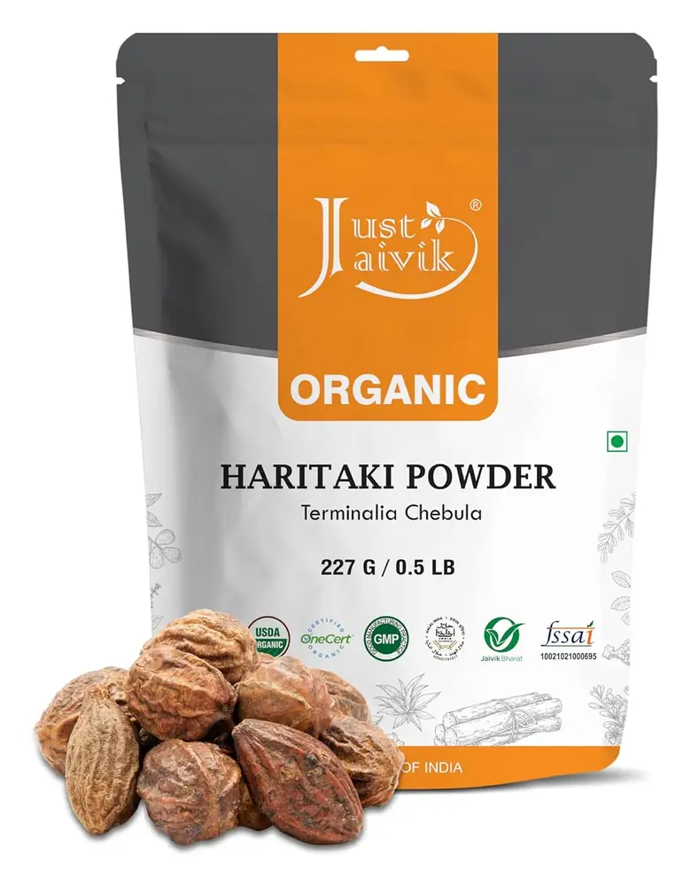 Pouch of Just Jaivik organic haritaki powder with whole fruits