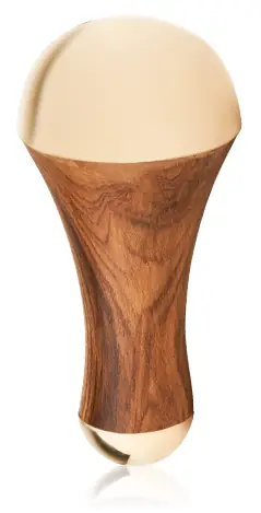Kansa wand with a wood-grain handle, seen from above