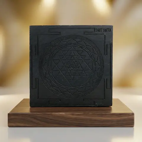 The block on a wooden base in soft light