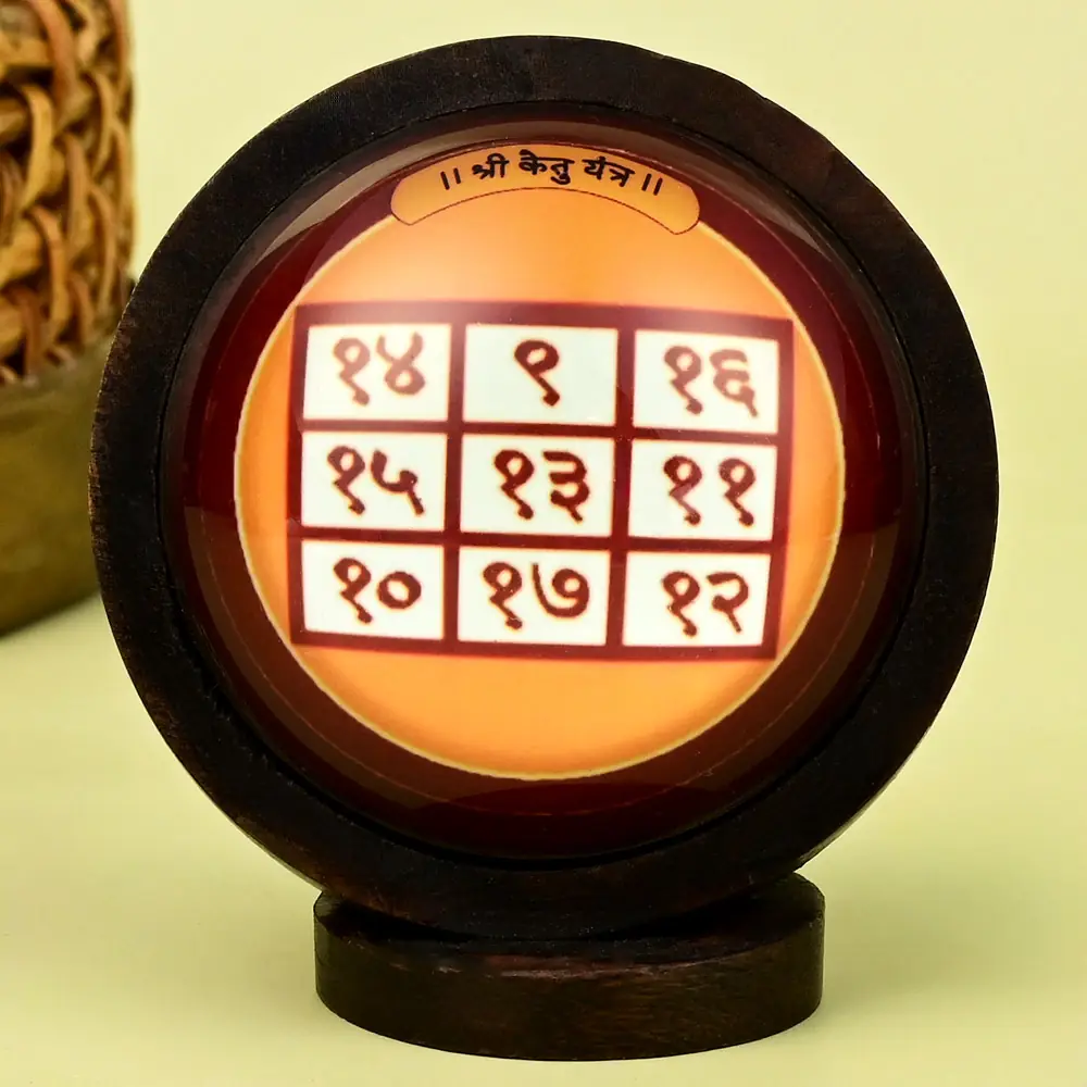 Ketu yantra grid in a round wooden frame on a stand