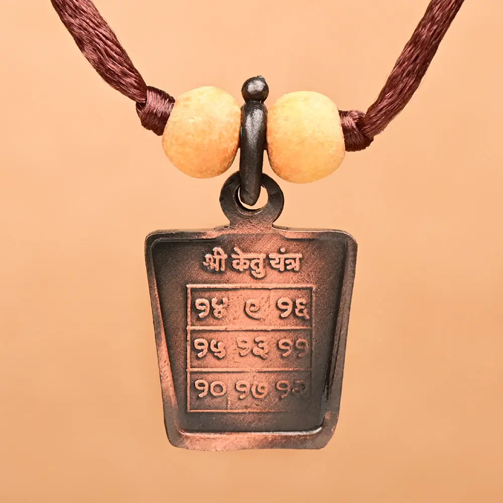 Ketu yantra side of the copper locket on a thread