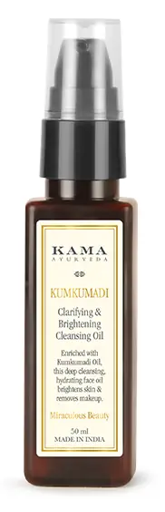 Brown glass bottle with a black pump, Kumkumadi Brightening Cleansing Oil