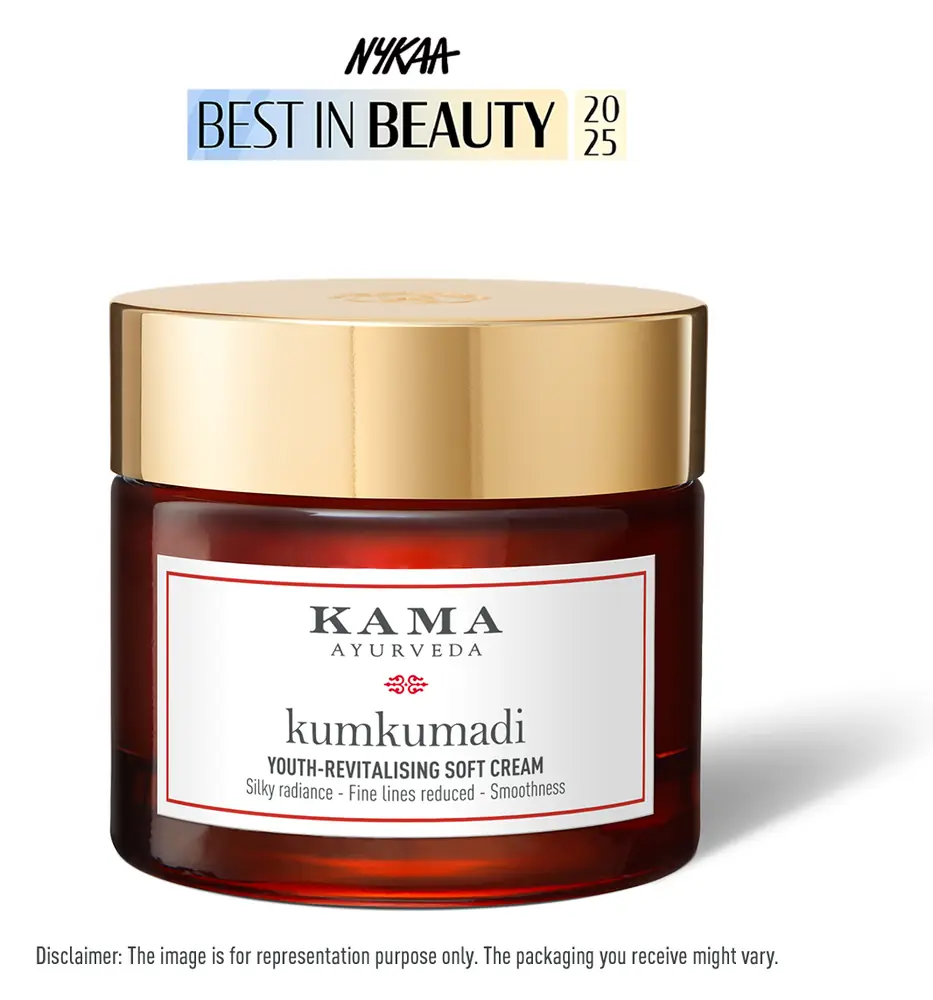 Red glass jar of Kumkumadi Youth-Revitalising Soft Cream with a gold lid