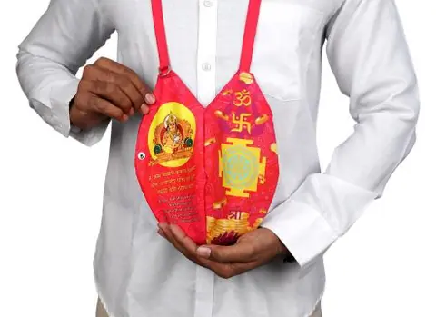 A person wearing the bag by its strap