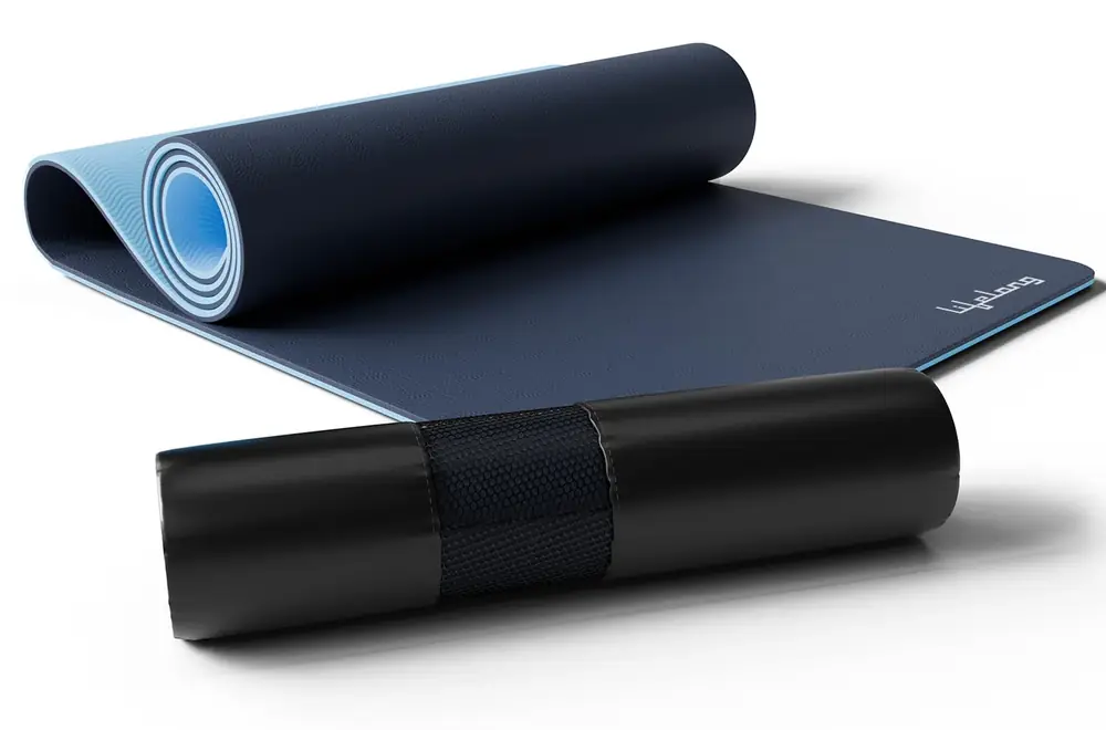 Rolled navy and blue TPE yoga mat