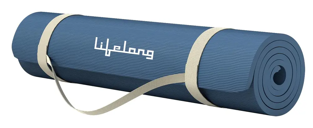 Blue yoga mat rolled with a cream strap