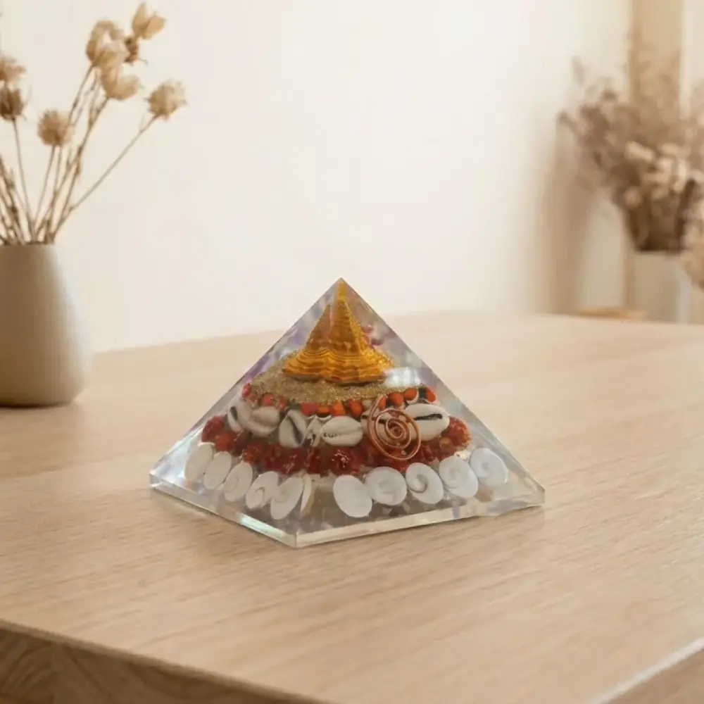 The pyramid on a light table with dried grass behind