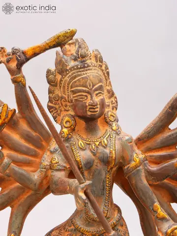Close view of the goddess's face and crown