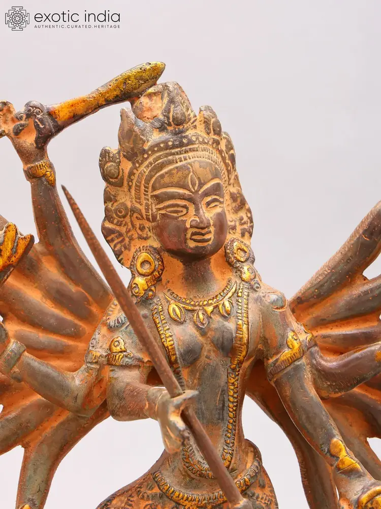 Close view of the goddess's face and crown