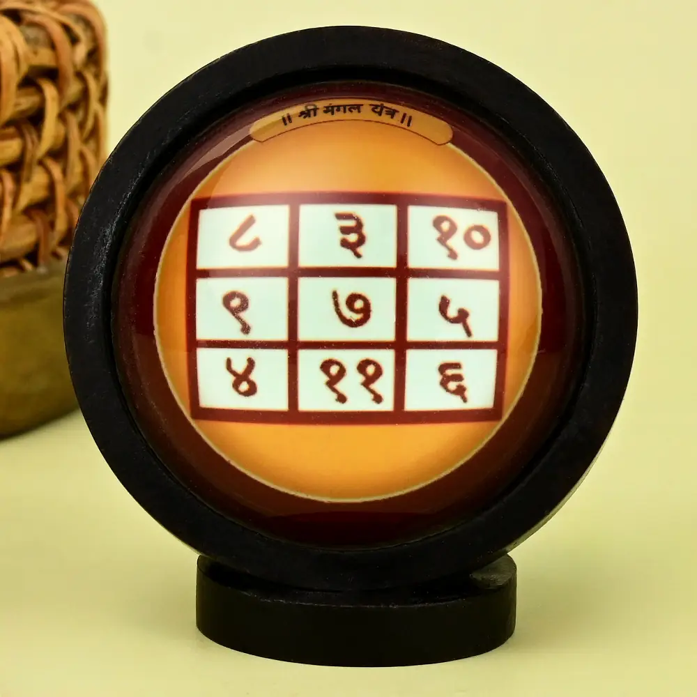 Mangal yantra grid in a round wooden frame on a stand