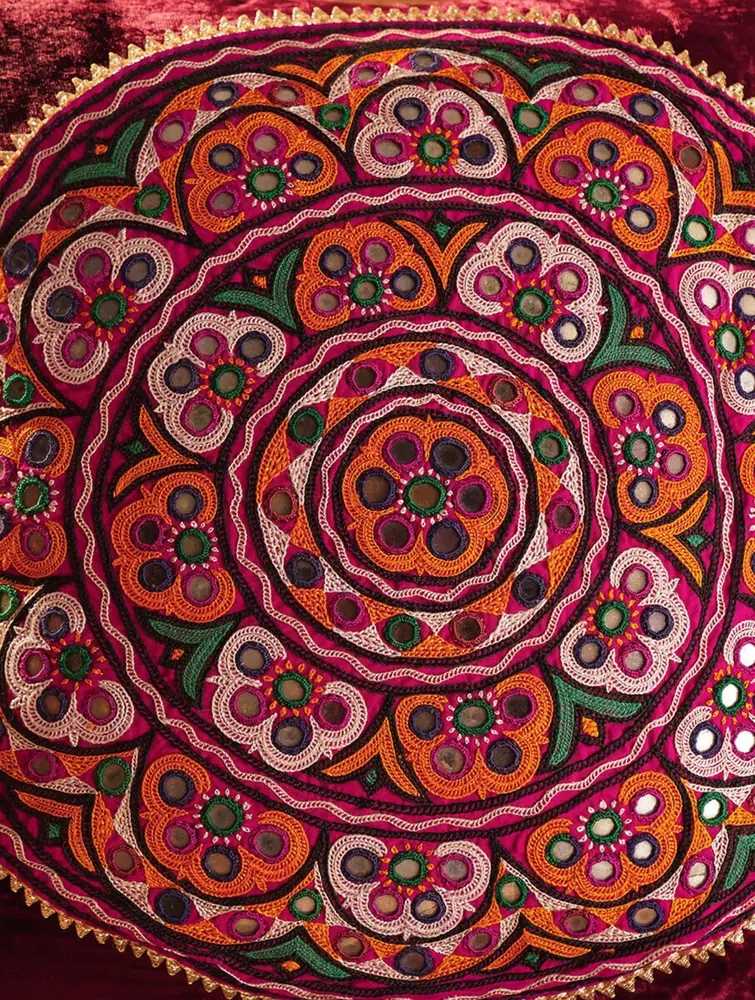 Another close view of the medallion in orange and pink thread