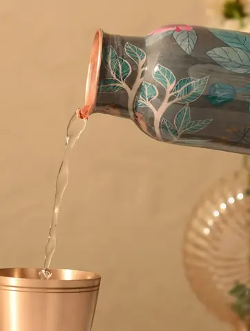 Water being poured from the bottle into a glass