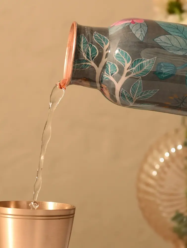 Water being poured from the bottle into a glass