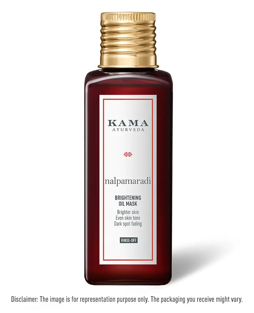Dark red glass bottle of Nalpamaradi Brightening Oil Mask with a gold cap