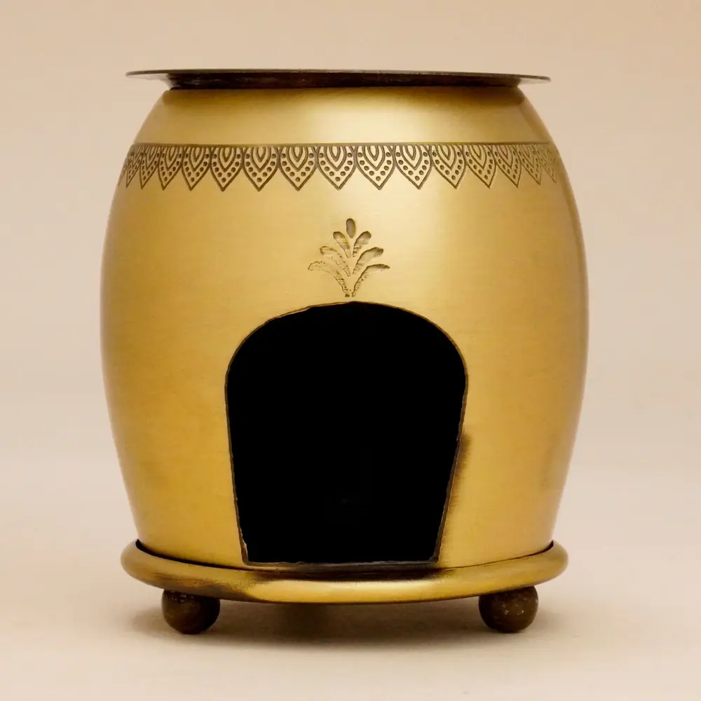 Brass Nandi oil burner seen from the front