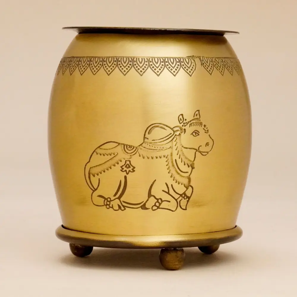 The side of the burner with the etched Nandi