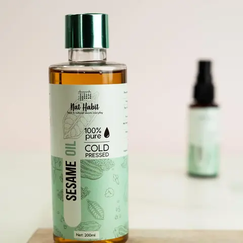 Bottle with a second small bottle behind it