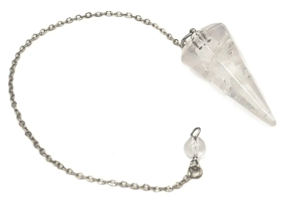 Pendulum chain laid out beside the stone