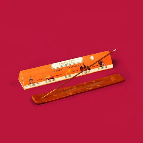 The box on a red background with a holder