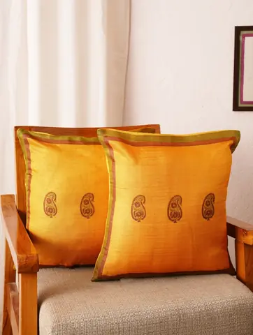 Two covers on a cane chair