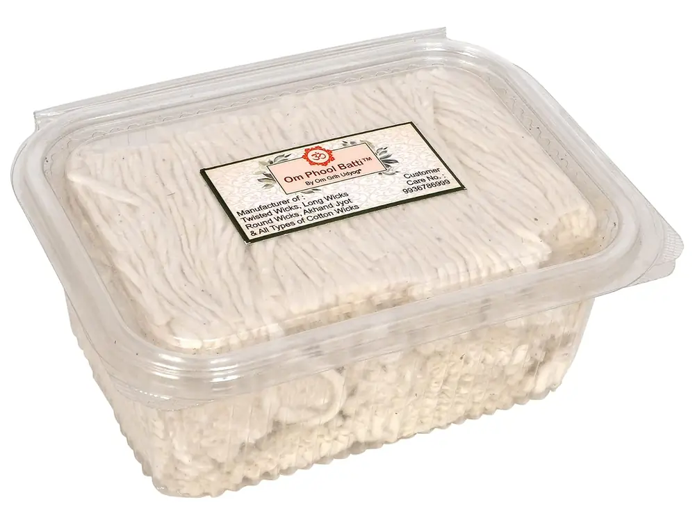 Clear box of wicks seen at an angle