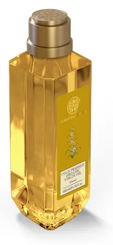 The bottle at a slight angle, showing the gold cap