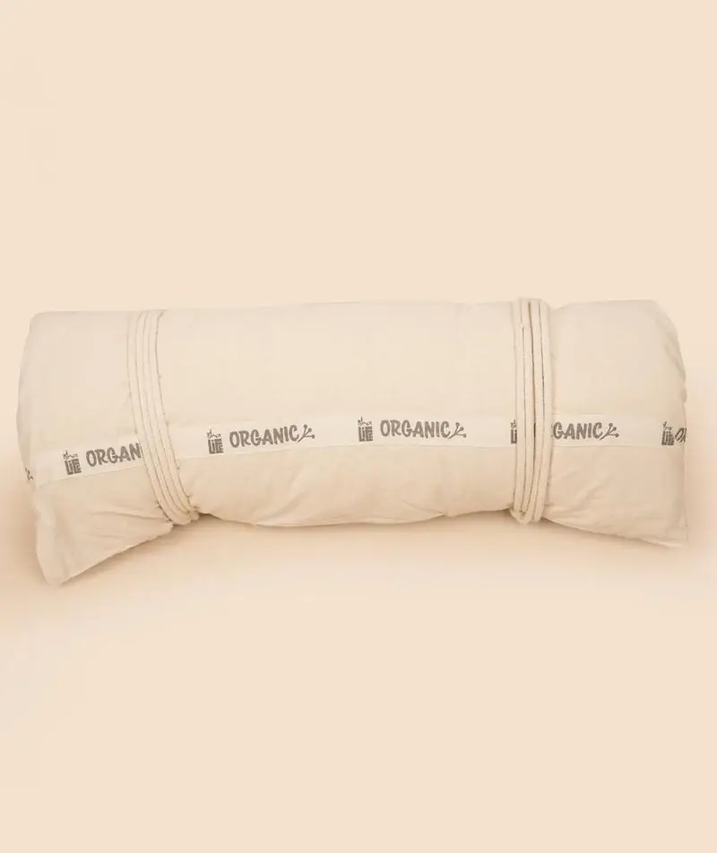 Cream mat rolled up with a label