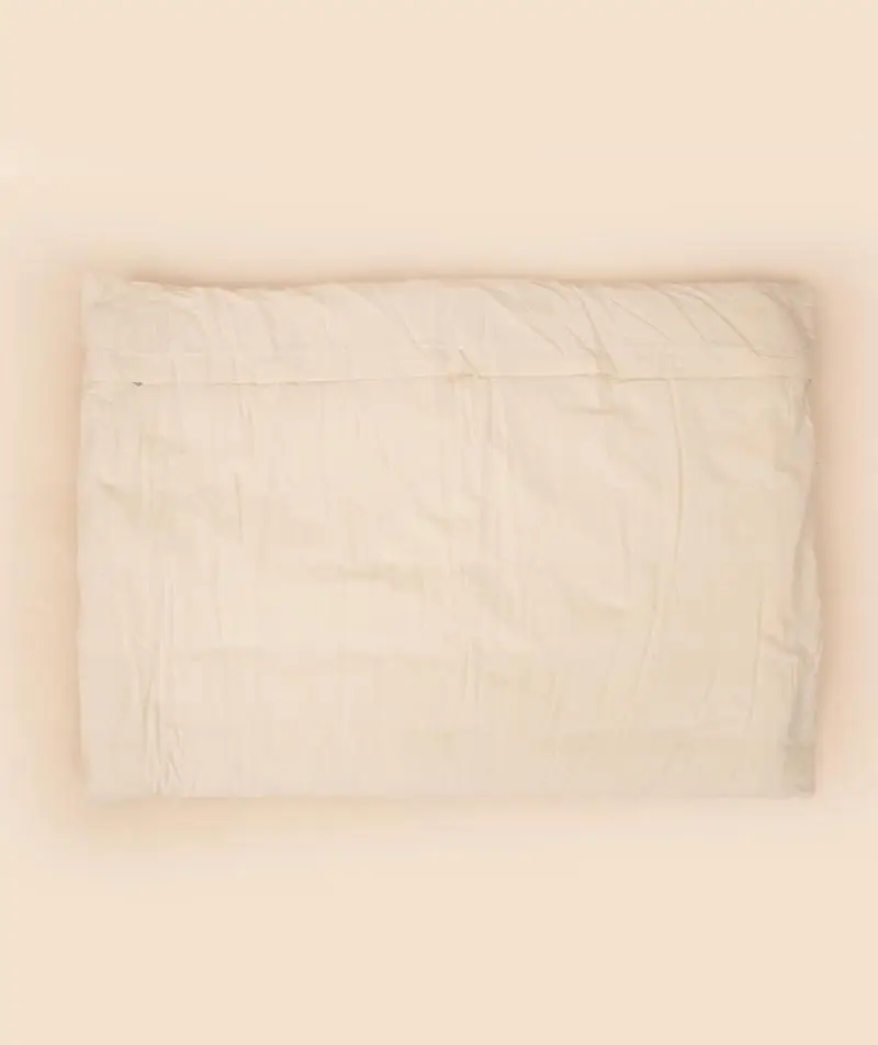Folded mat in its cream cover from another angle