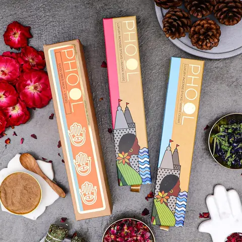 The boxes among cinnamon sticks and flowers