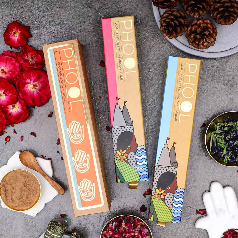 The boxes among cinnamon sticks and flowers