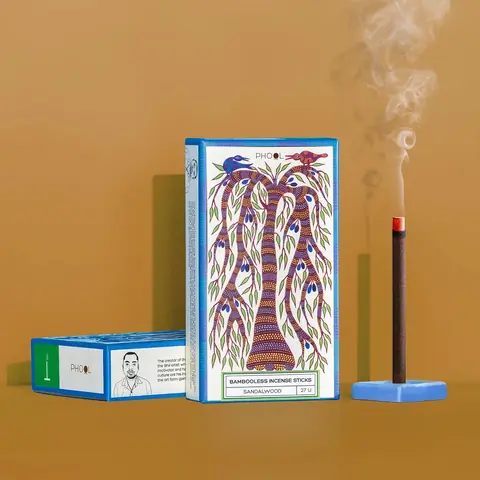The box beside a stand with a burning stick