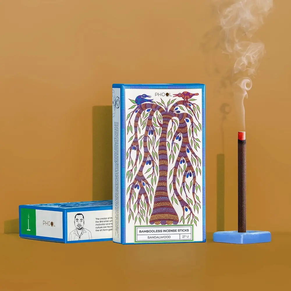The box beside a stand with a burning stick