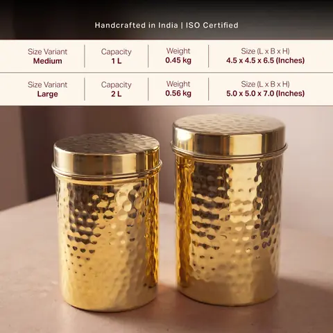 Two brass canisters of different sizes side by side