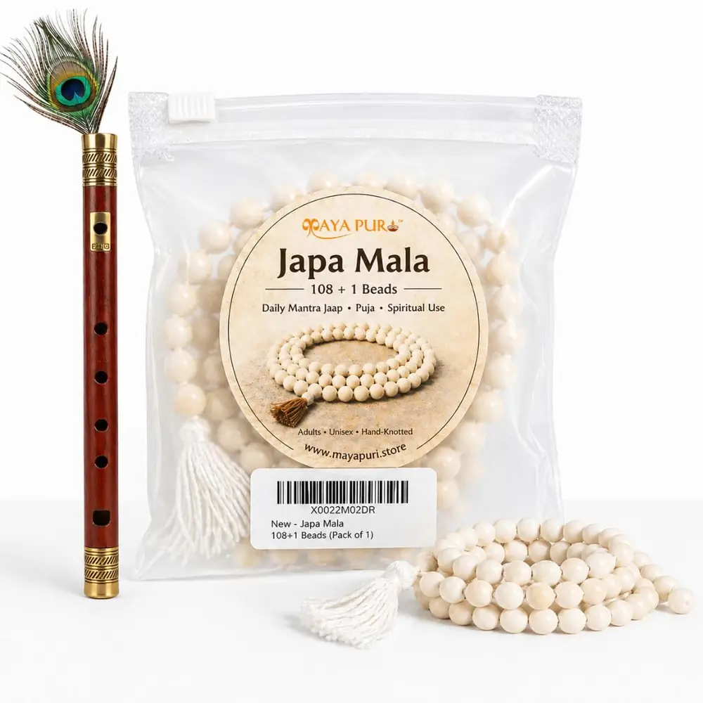 The mala in its pouch beside a flute