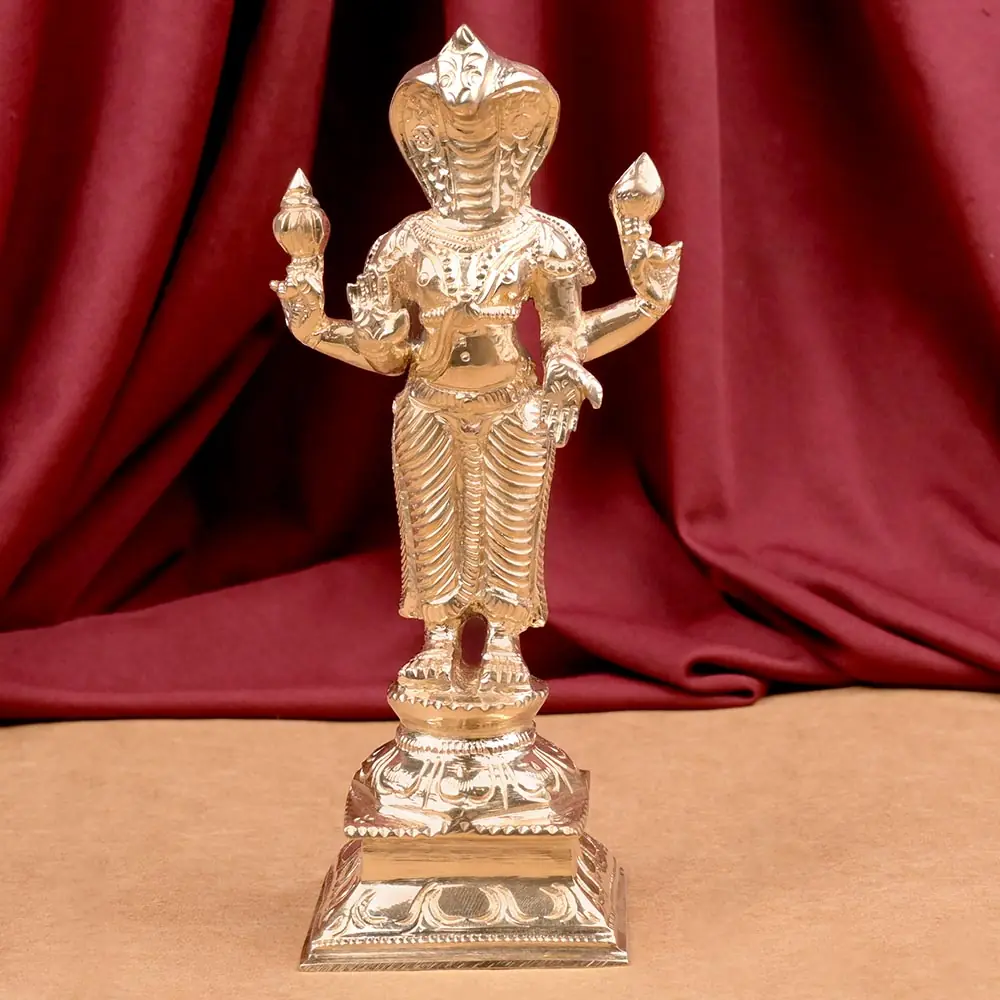 Rahu bronze idol with a snake hood on its dais