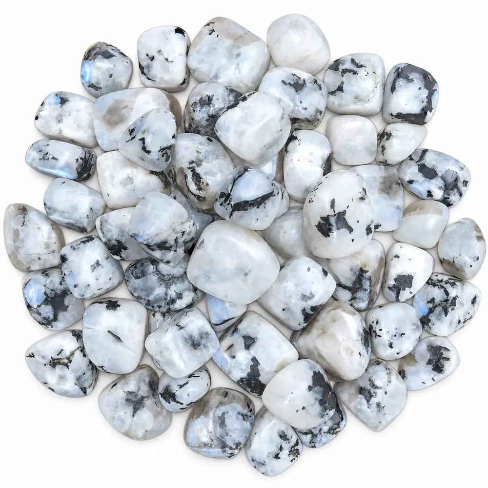 A heap of pale tumbled rainbow moonstones