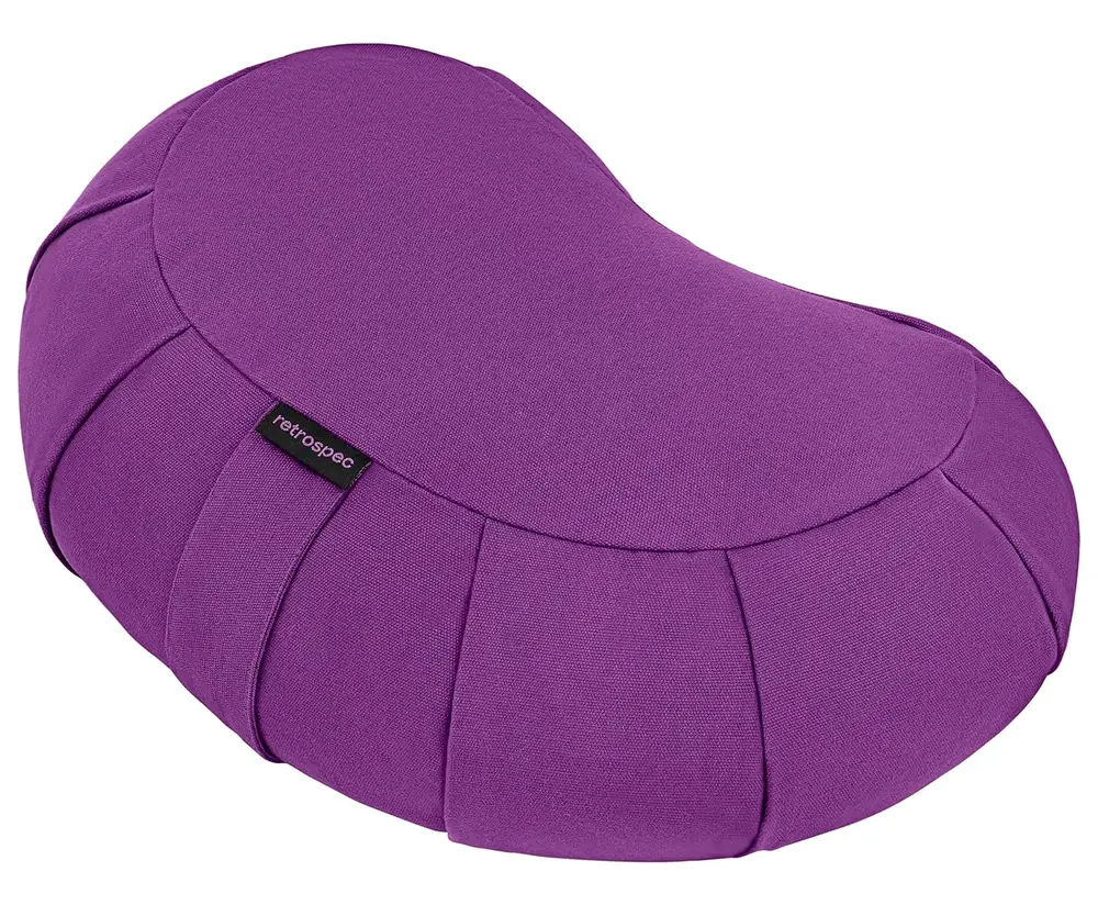 Purple crescent zafu meditation cushion on a white ground