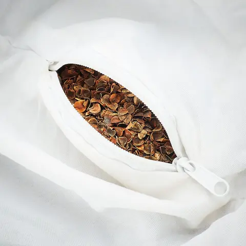Inside the cover showing the buckwheat hulls