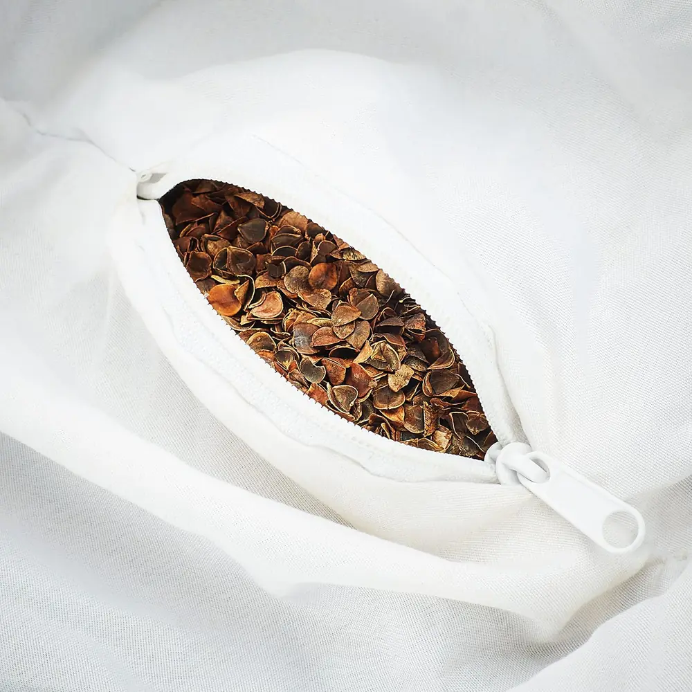Inside the cover showing the buckwheat hulls