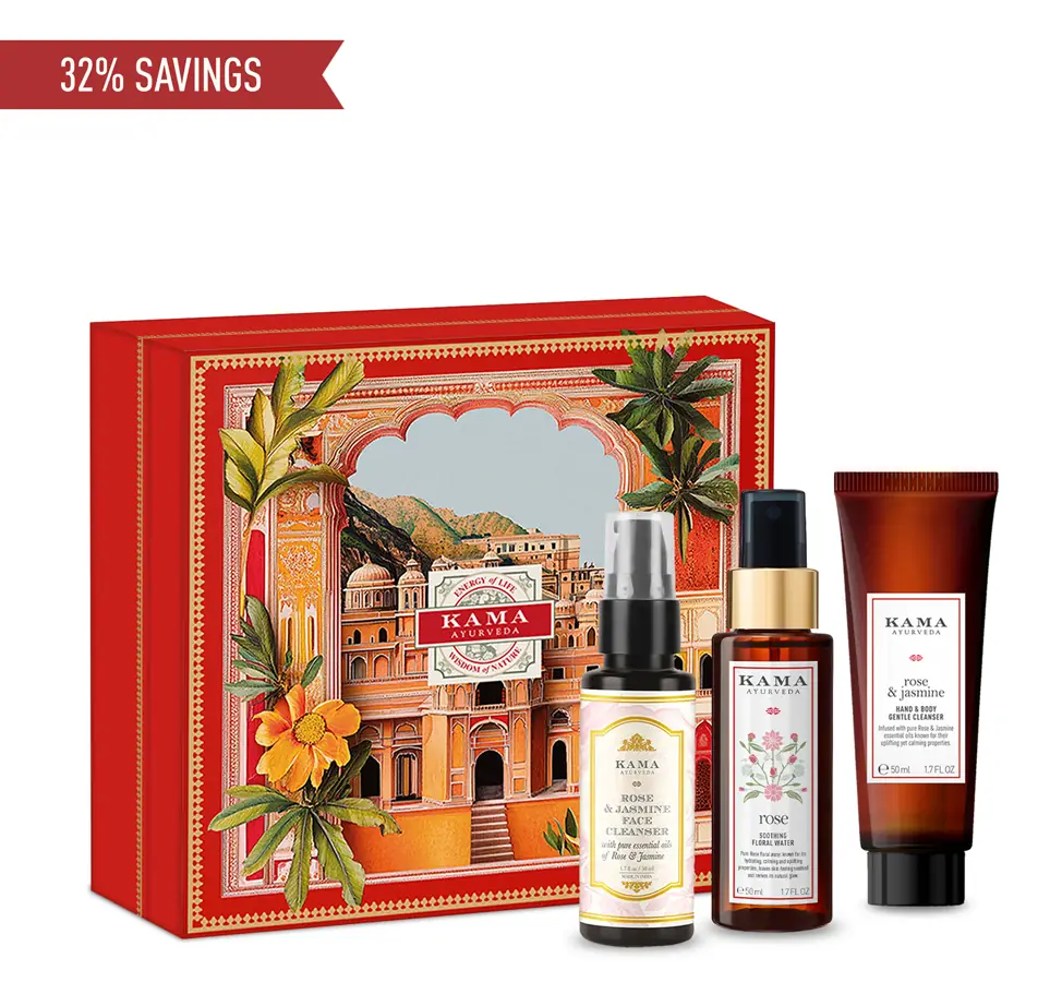 Red Rose Radiance gift box with three bottles beside it