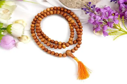 The mala with flowers and a tassel