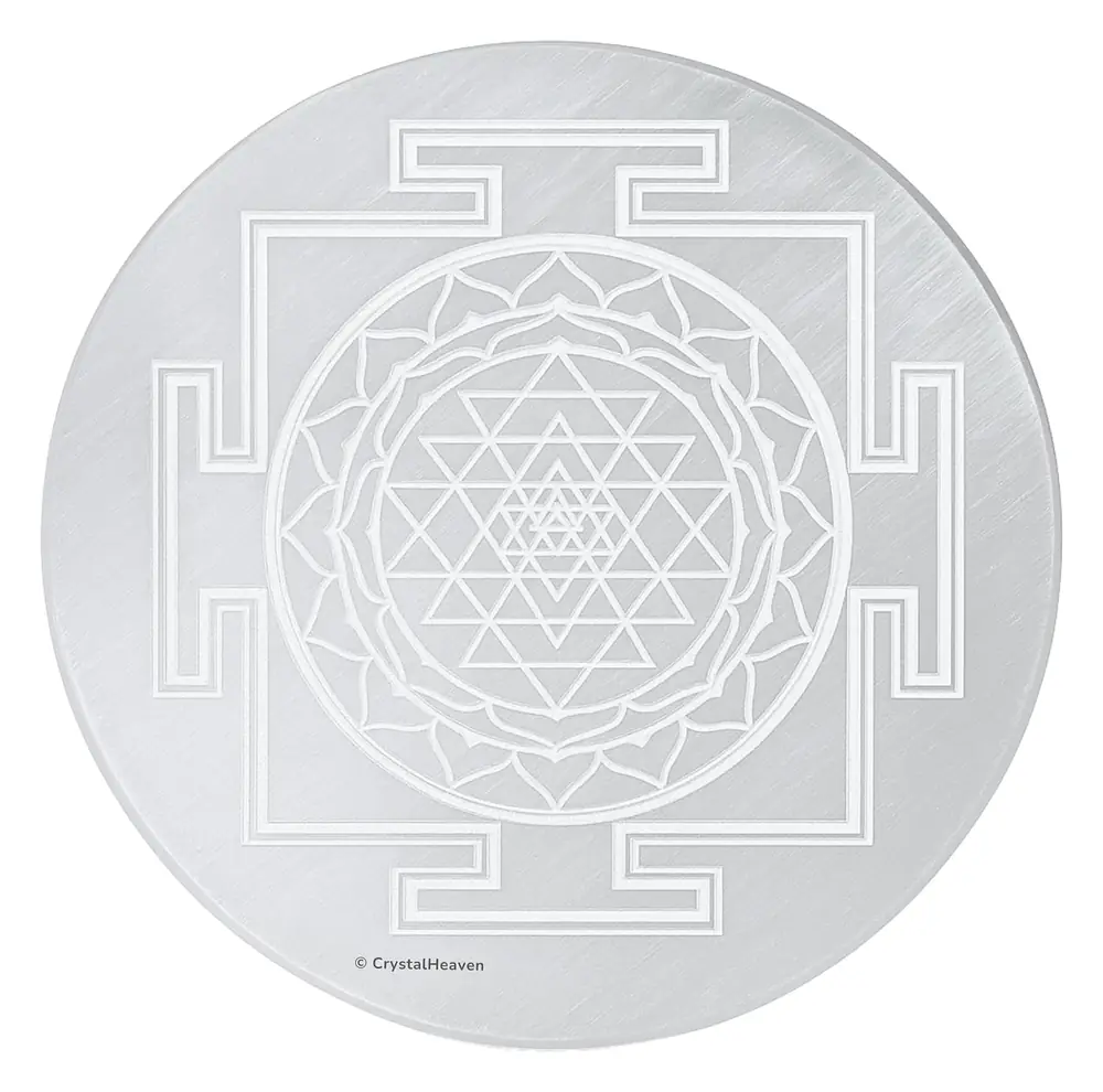 Top view of the round selenite plate engraved with the Sri Yantra
