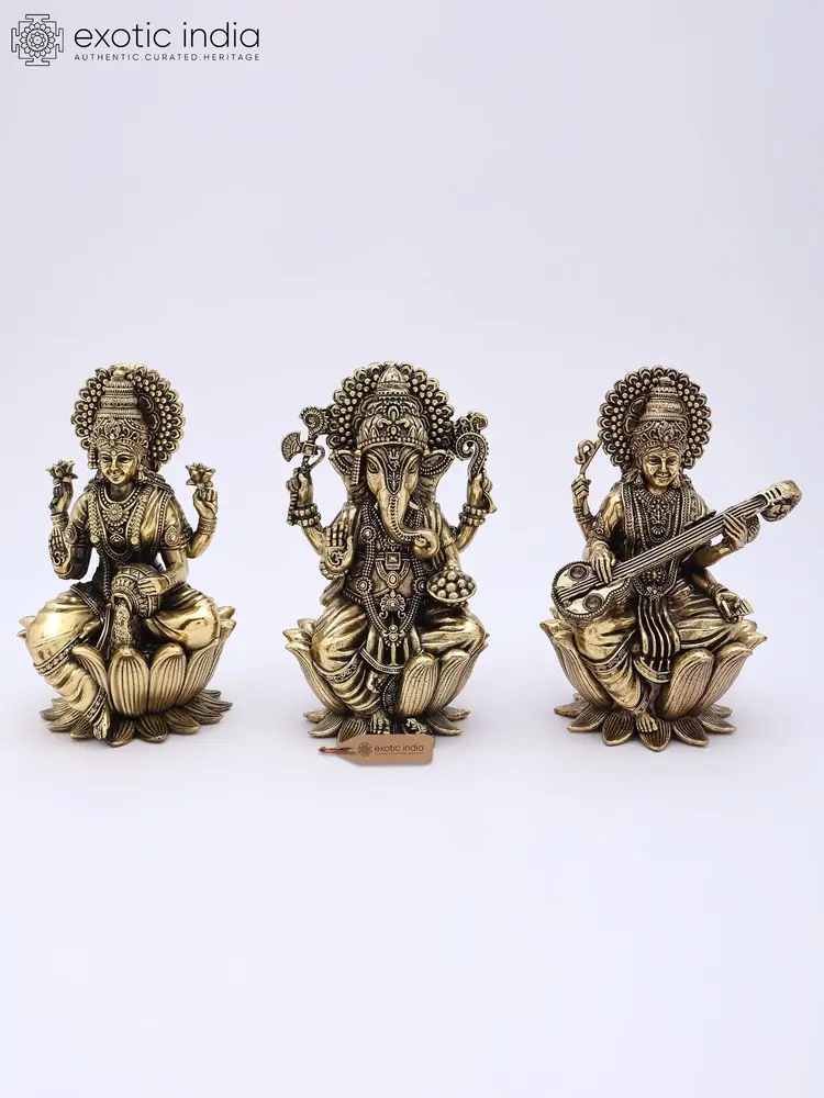 The three brass statues side by side