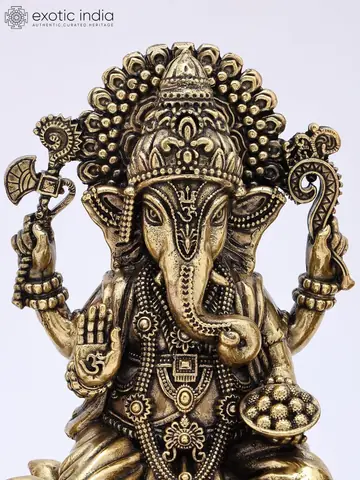 Close view of the Ganesha figure's face and crown