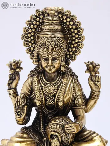 Close view of the Lakshmi figure's face and crown