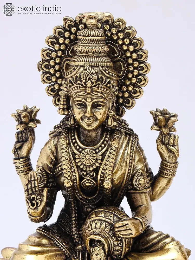 Close view of the Lakshmi figure's face and crown