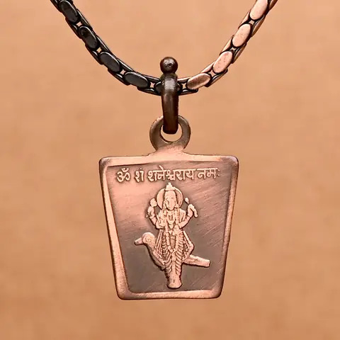 The deity side on a dark chain