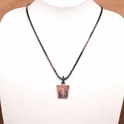 The locket on a jewellery bust